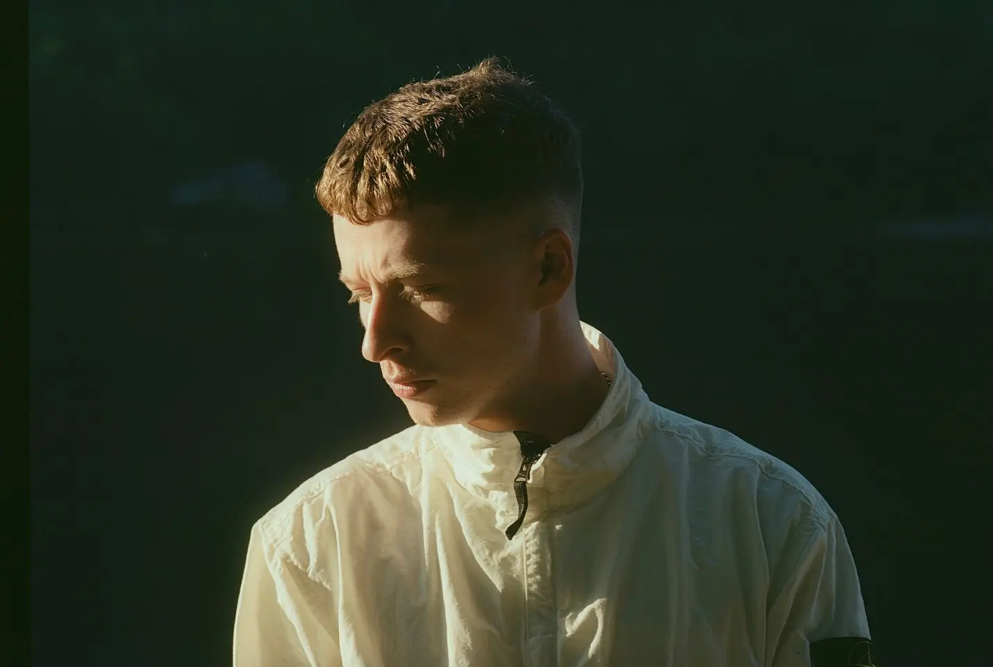 Sam Gellaitry wearing a white jacket