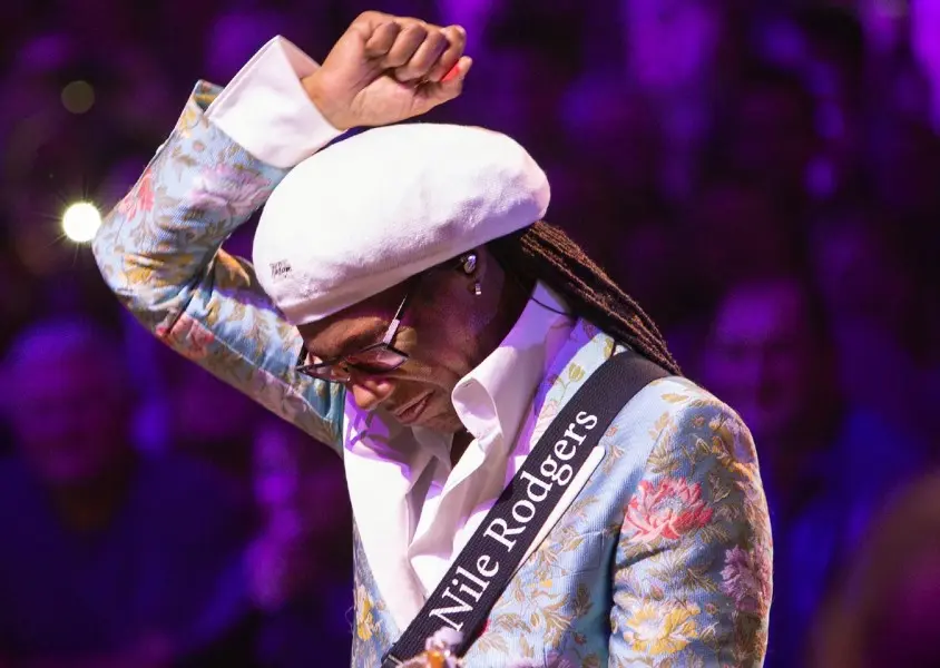 Nile Rodgers on a stage.