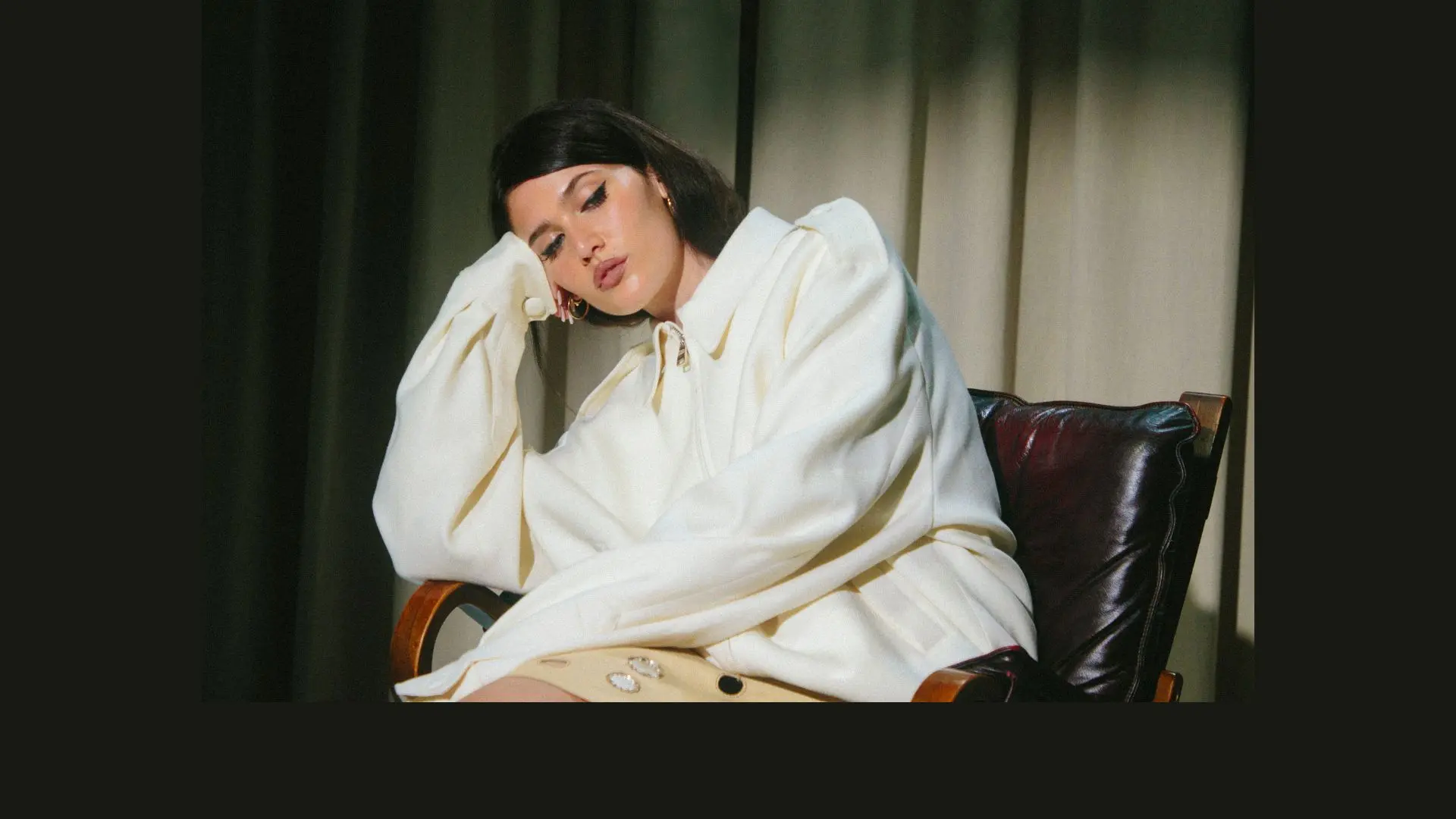 Sienna Spiro in a white shirt