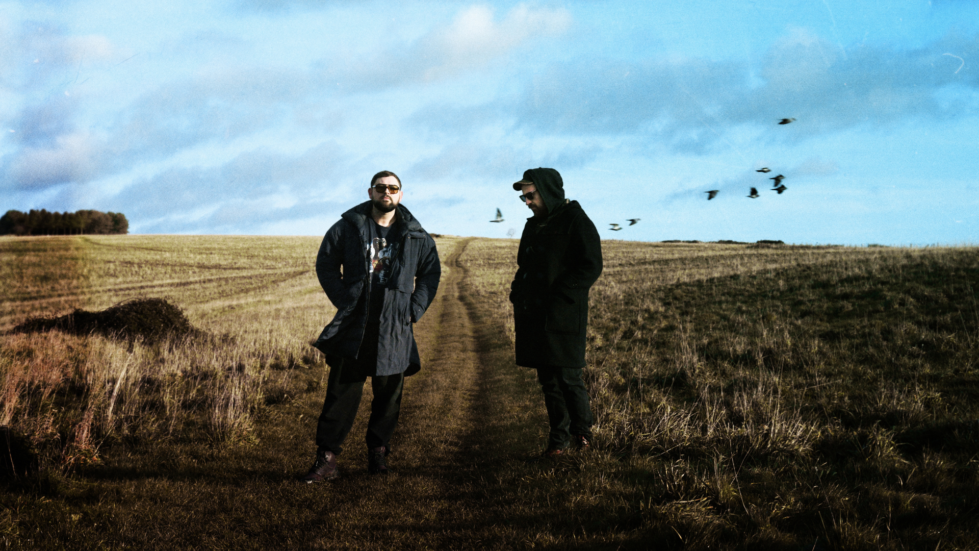 Artist The Twilight Sad standing in field