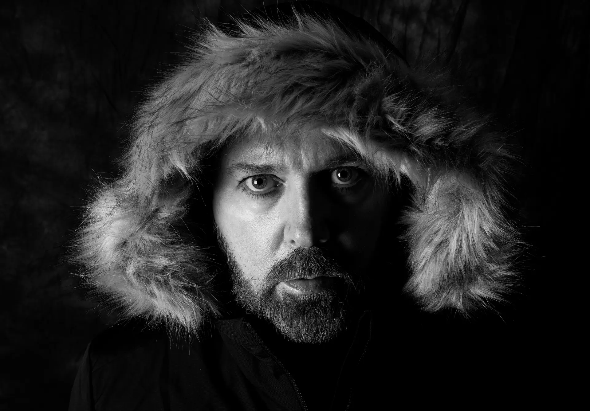 paul draper with furry hooded jacket