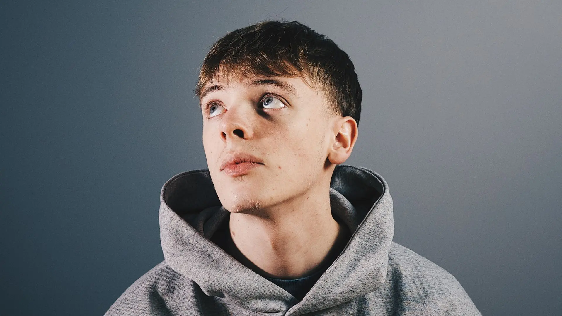 Ewan McKenna in a grey hoodie