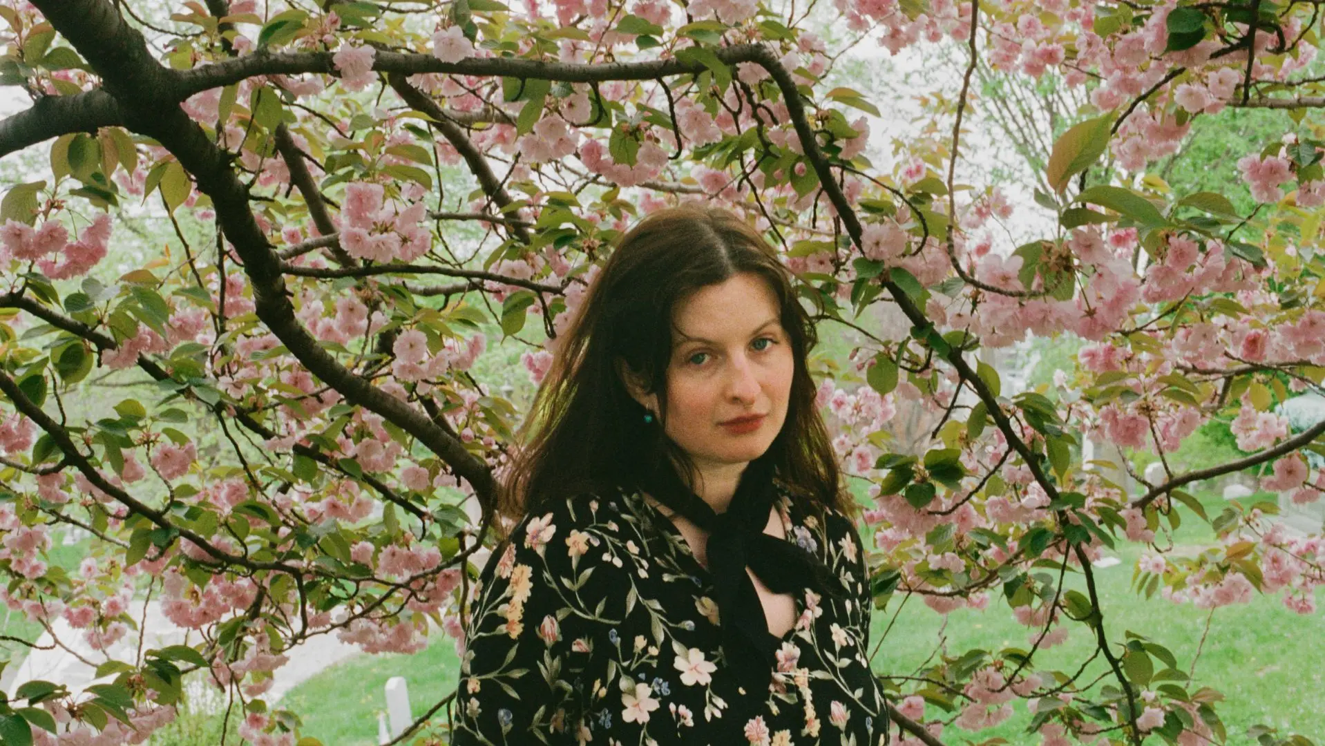Theo Bleak stood under cherry blossoms