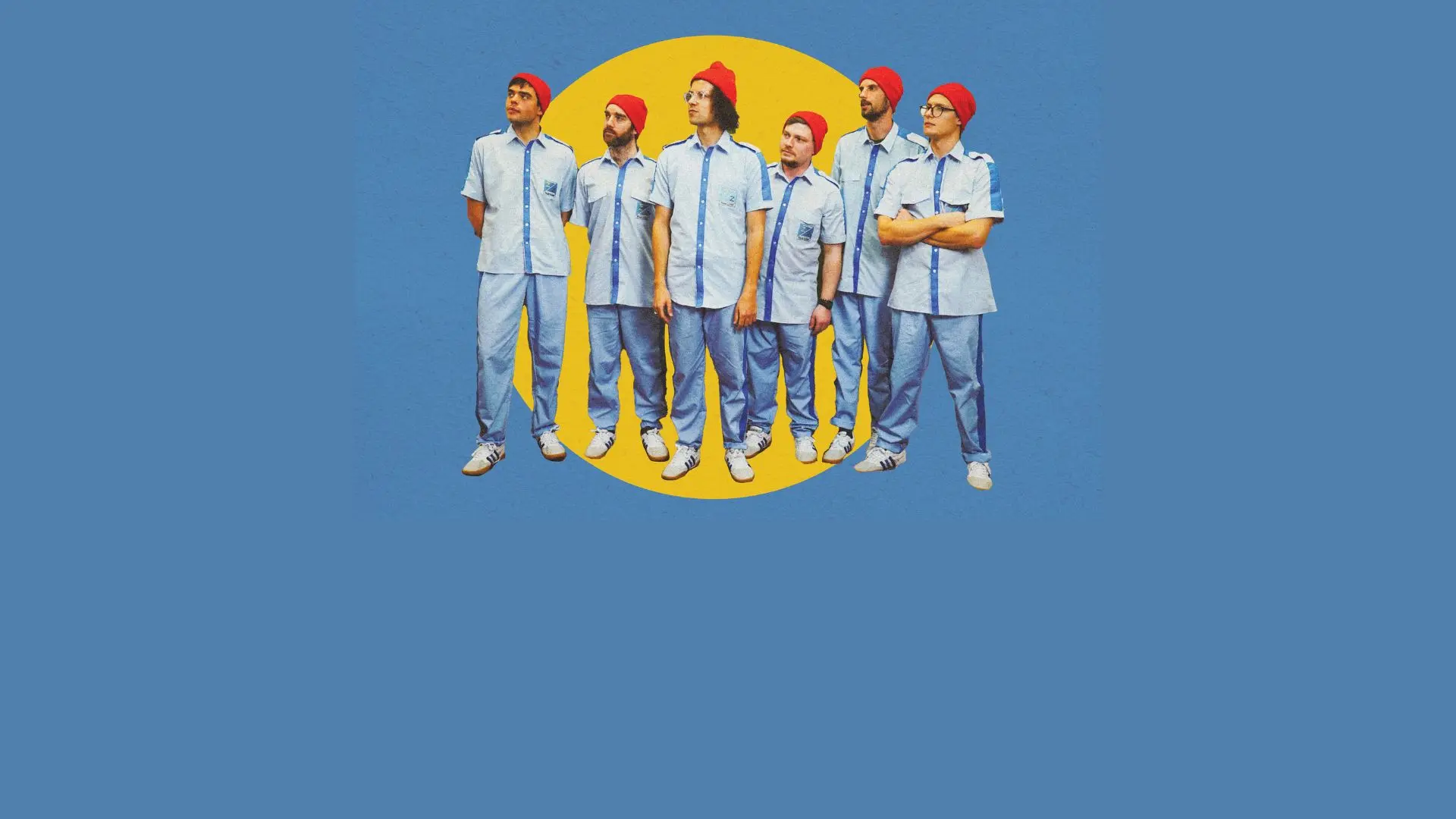 Wes Banderson stood in front of a yellow circle