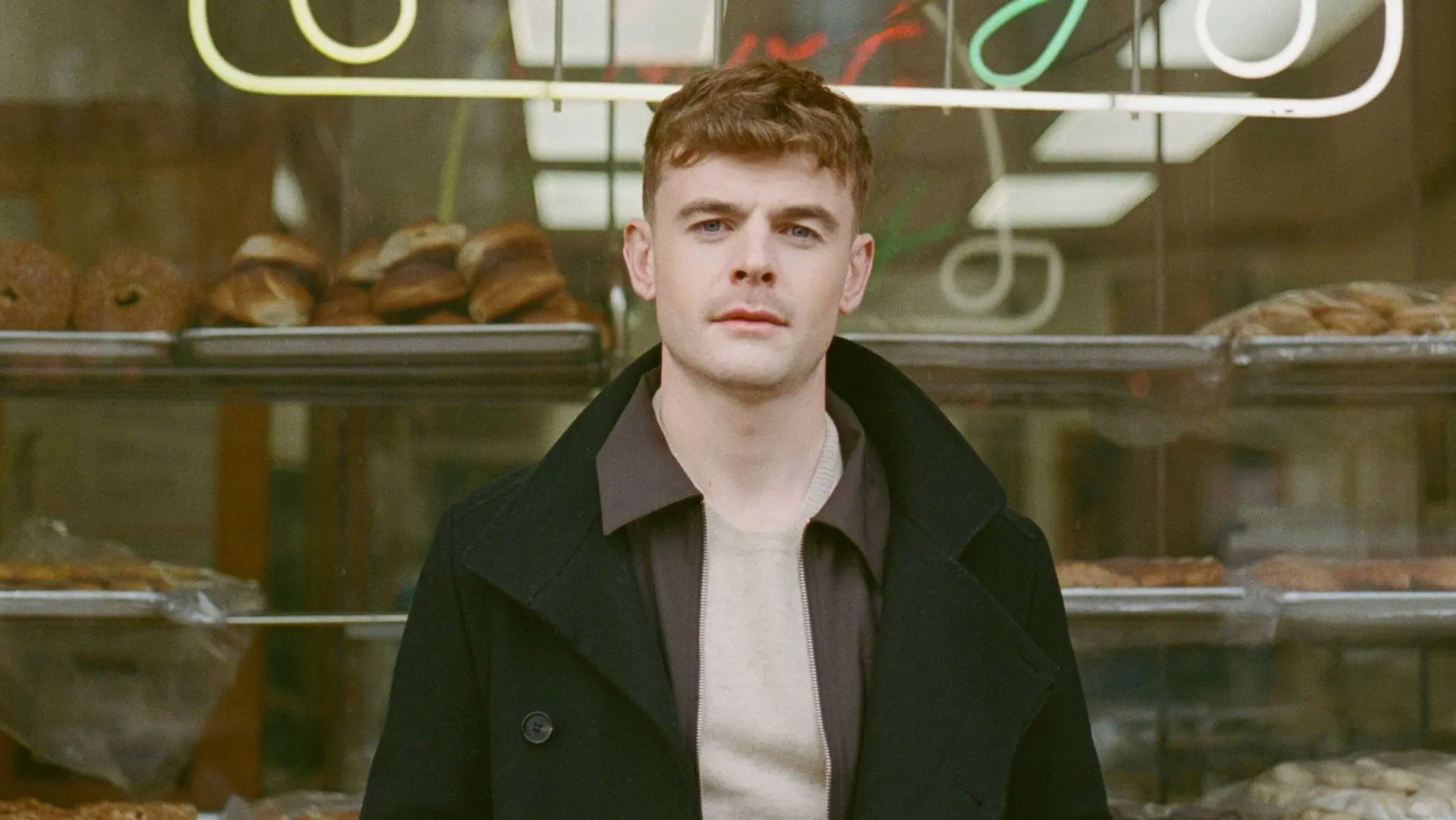 Darren Kiely stood in front of a shop window