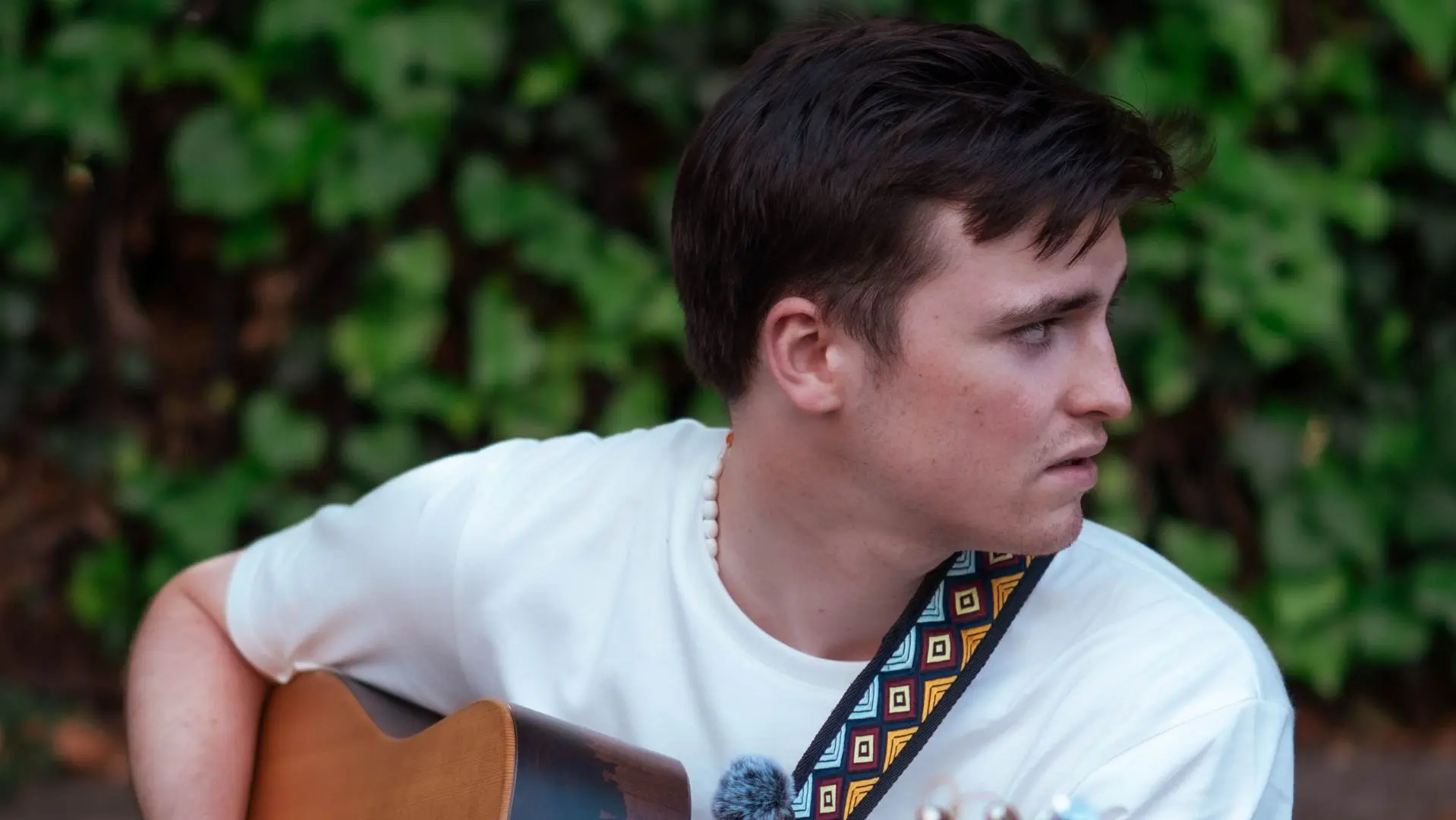 Dan Parks holding a guitar