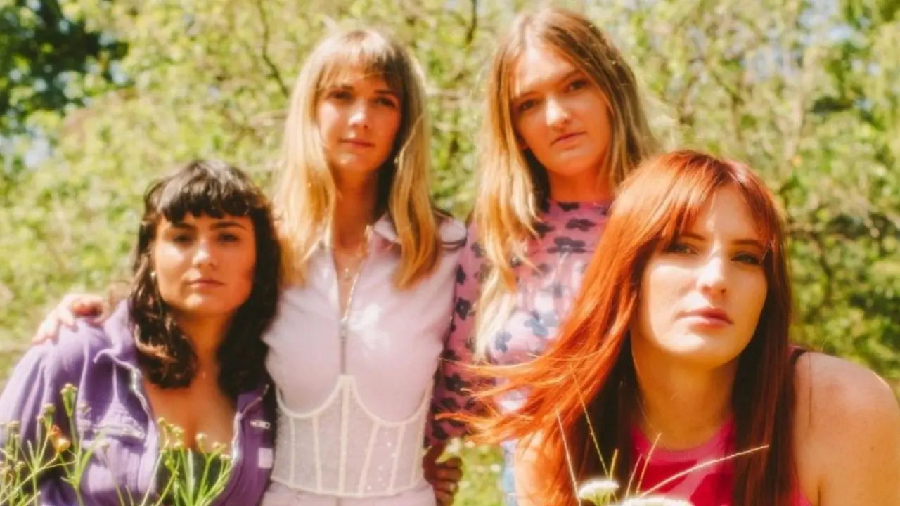 Four Women stood in a field