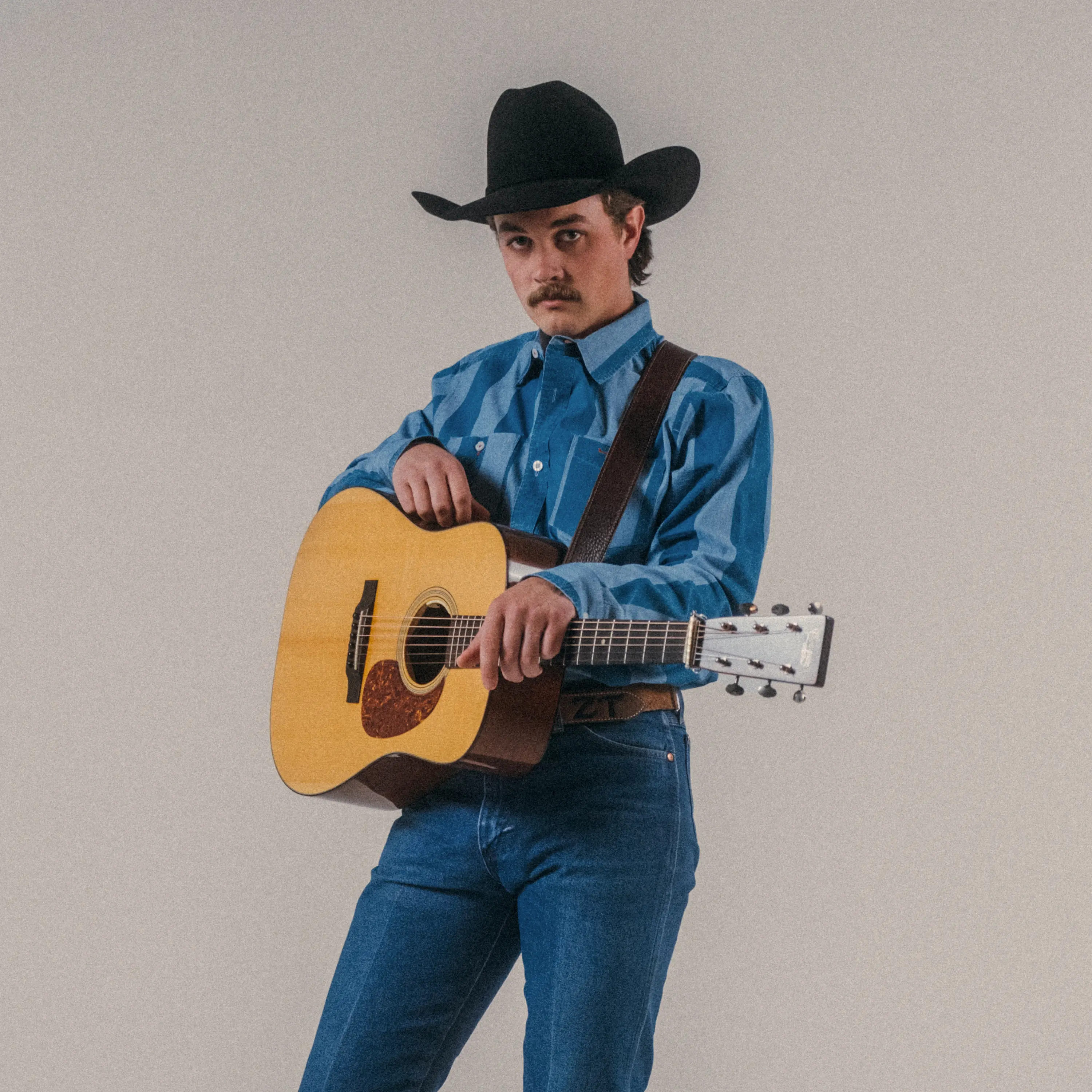 Zach Top with his guitar