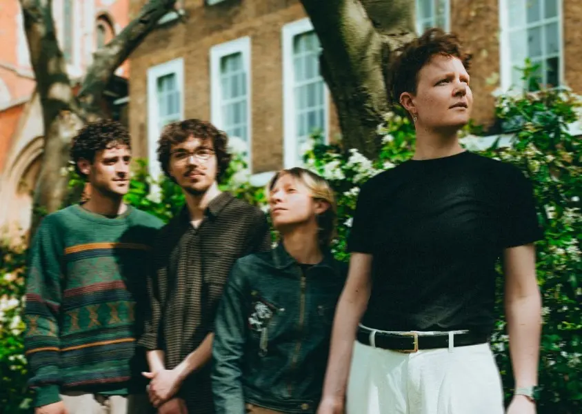 Four members of Hailaker looking away from the camera