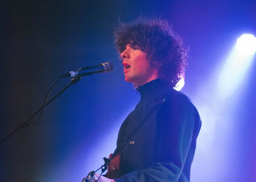 Dylan John Thomas on a stage.