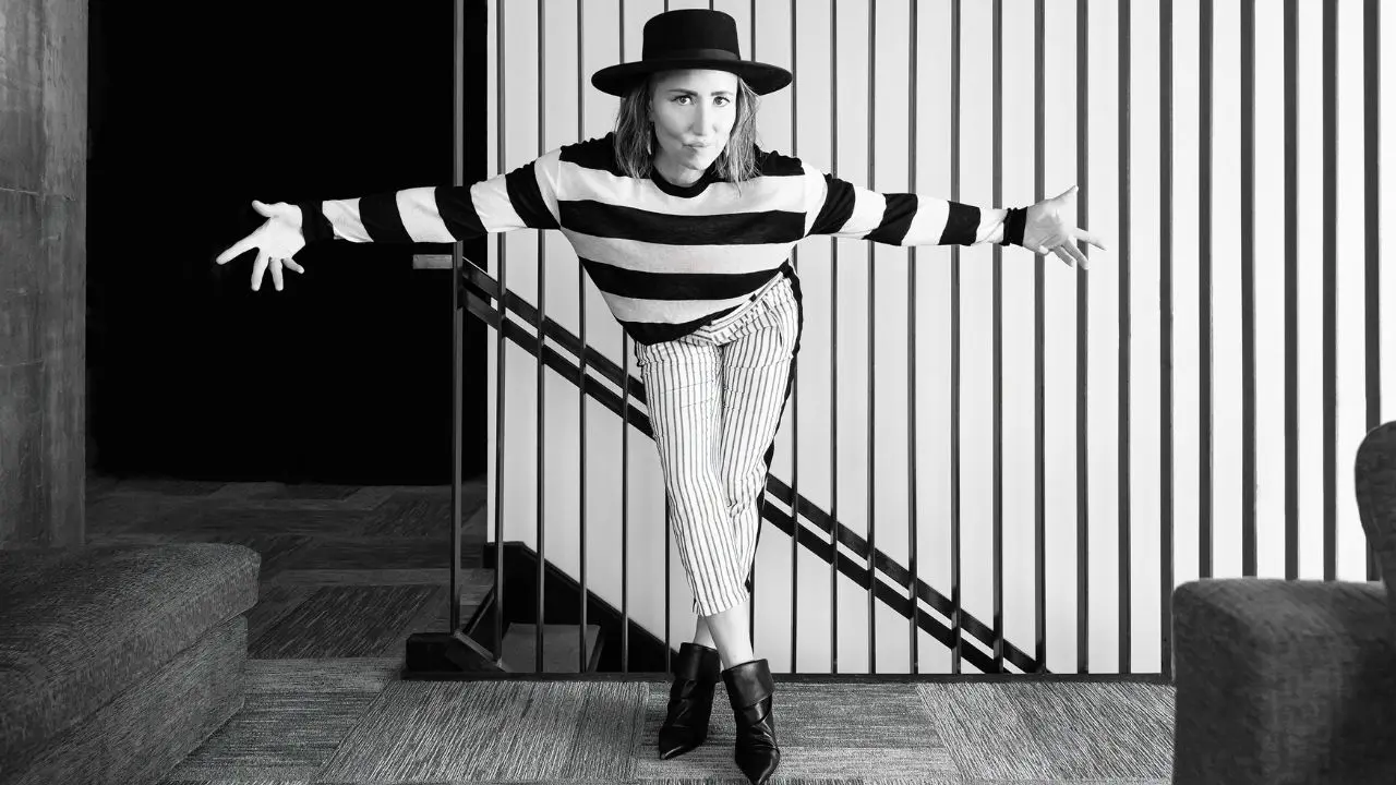 Black and white photo of artist KT Tunstall wearing a striped top
