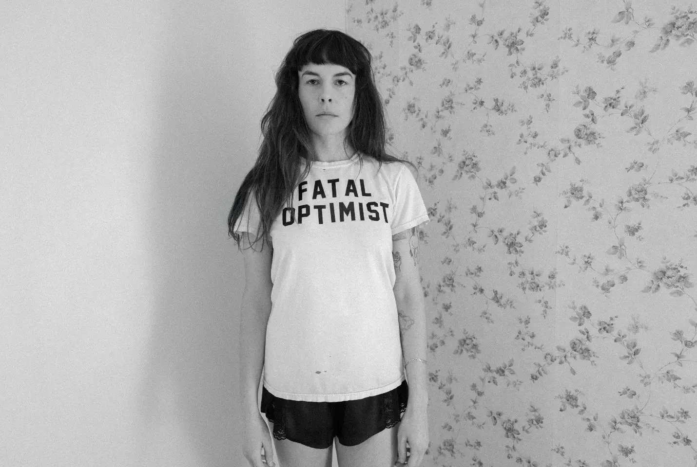 A woman stood in the corner of a room